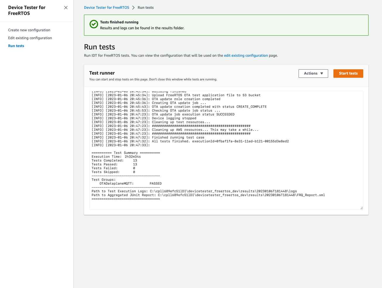 Device Tester untuk log eksekusi FreeRTOS yang menunjukkan tes lulus, grup pengujian, dan jalur file untuk log dan laporan.