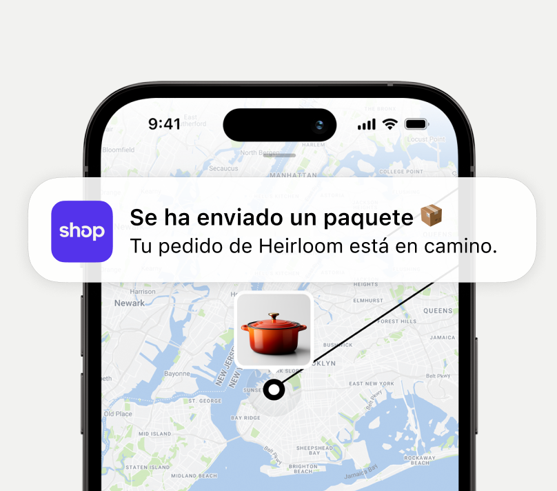 Teléfono inteligente que muestra una notificación de seguimiento de paquetes de la aplicación Shop sobre un mapa.