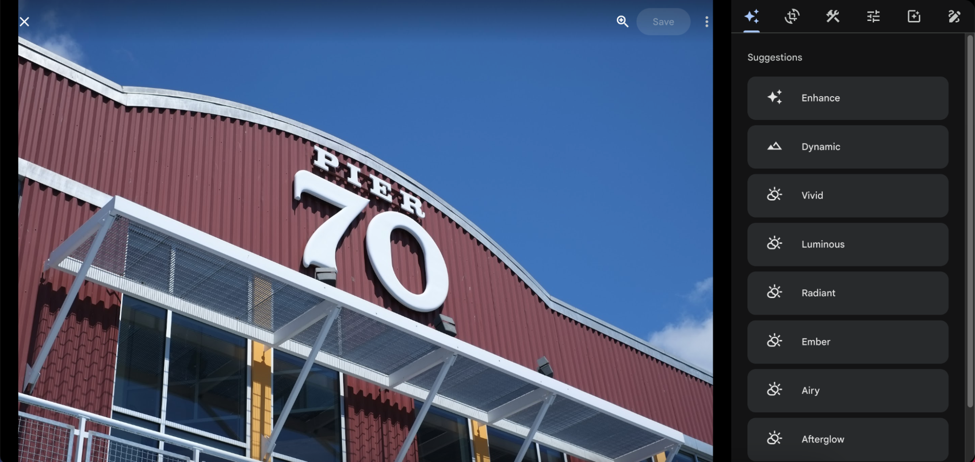A photo of the front of a building with a Google Photos UI sidebar to make image adjustments.