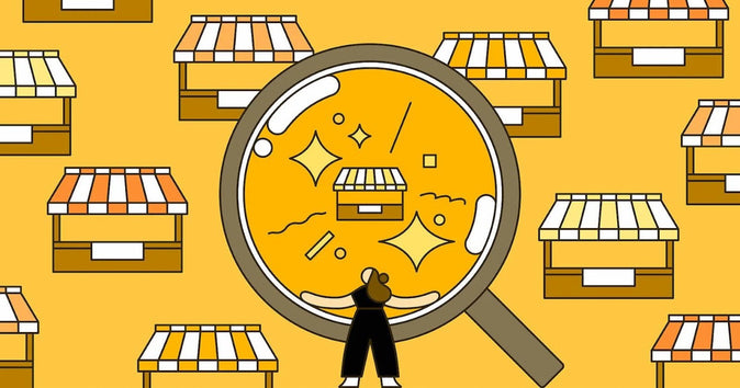 Illustratie van een persoon die een vergrootglas omhoog houdt naar een winkel, wat de specialisatie van een nichemarkt vertegenwoordigt.
