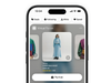 A smartphone displays the Shop app, featuring a virtual try-on shopping experience