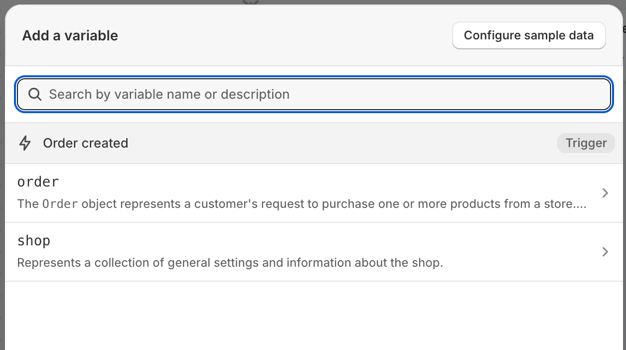 Image of a Shopify Flow 'Add a variable' dialog. The example trigger displayed is the 'Order created' trigger, and the two datasets available in the dialog are 'order' and 'shop'.